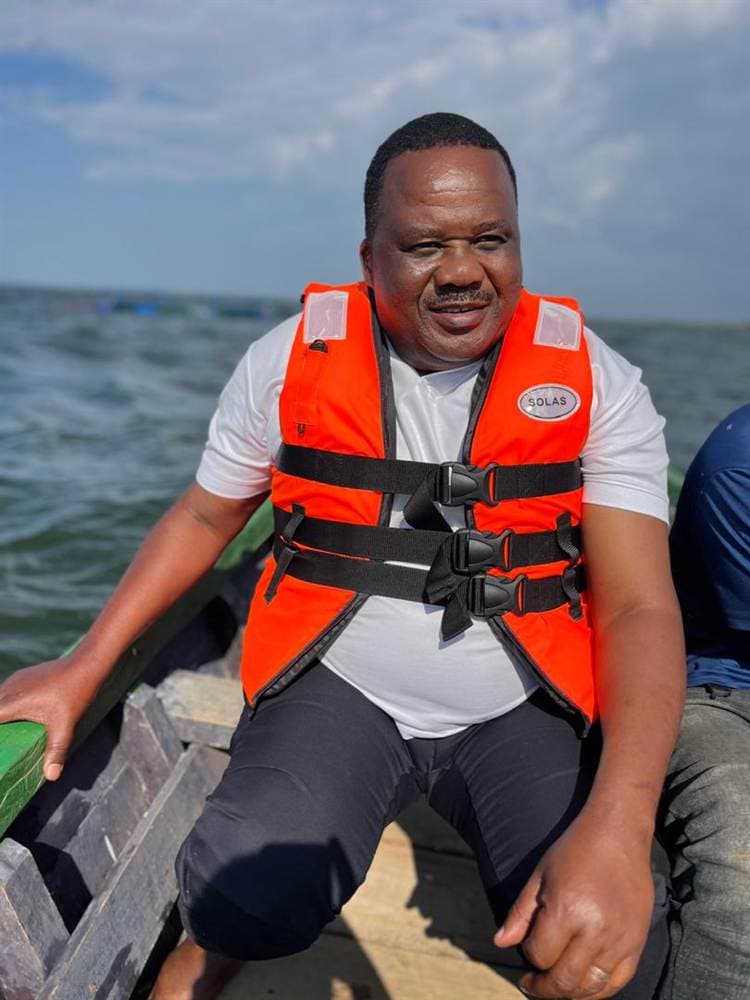 A member of the Samo family on the water at the Itumbuli cage site